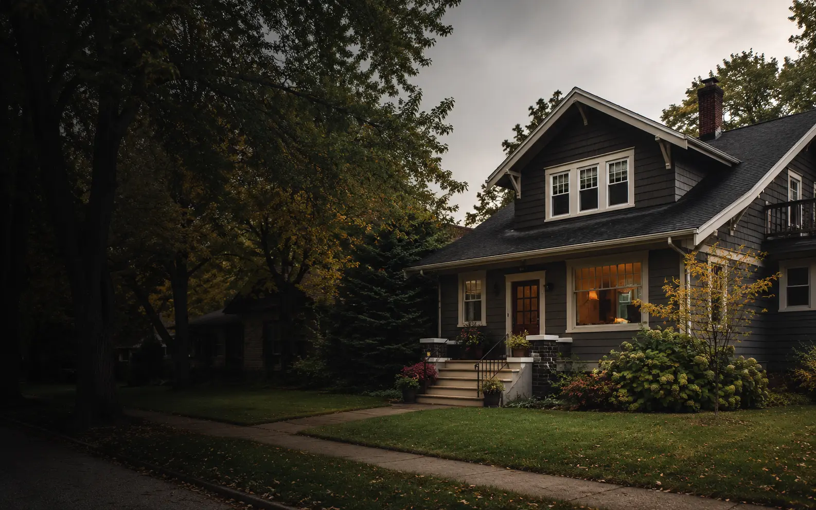 A well-kept Midwestern home on a quiet tree-lined street